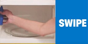Hand cleaning tray inside a microwave
